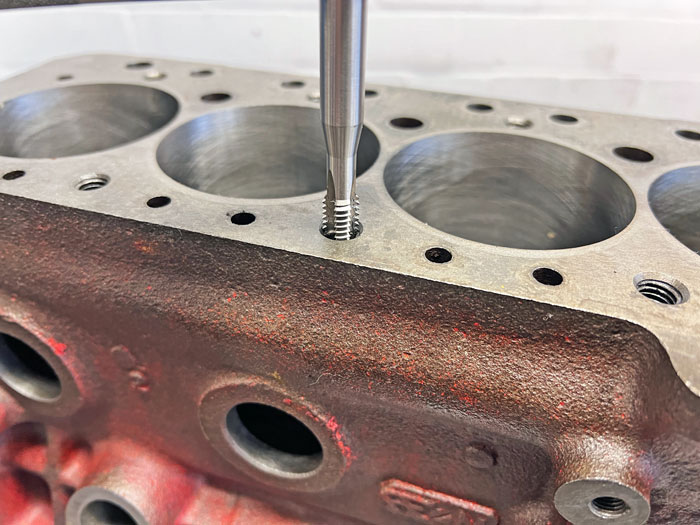Chamfered Bolt holes in a mini sport cylinder block