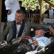 Mike Cooper and Sir Jackie Stewart Goodwood Revival Mike Cooper and Sir Jackie Stewart