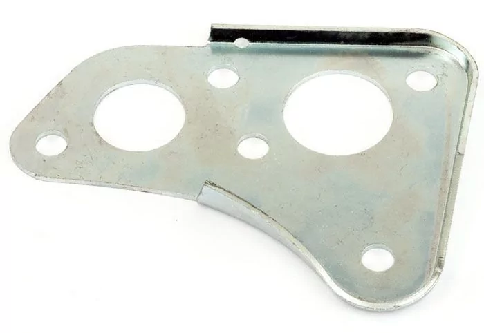 Mini 1989 brake servo type brake master cylinder and engine steady bar mounting plate.